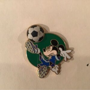 Disney resort Mickey Mouse kicking soccer ball. Free D sports series. 20…